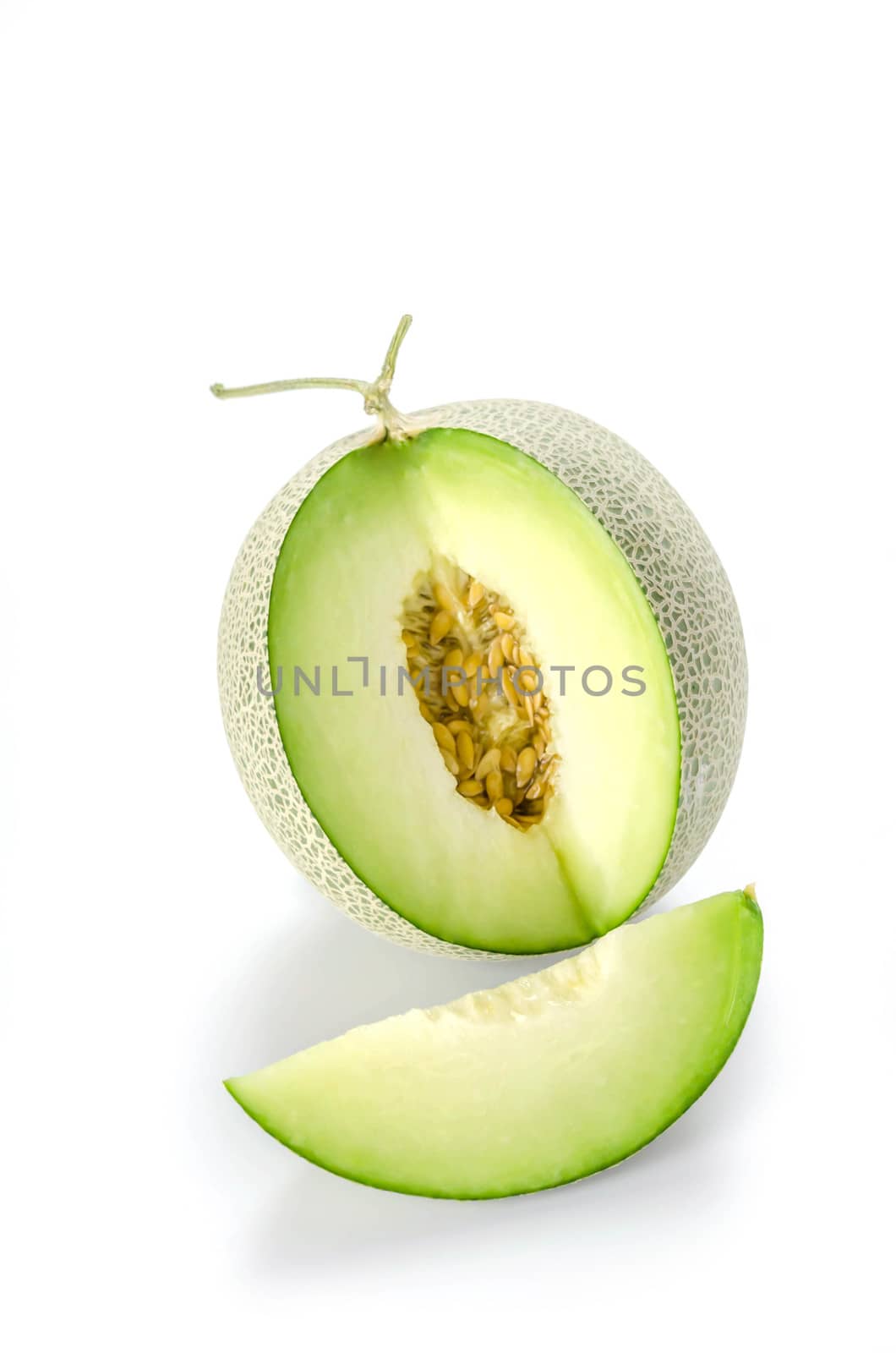 shopped green melon isolated on white background