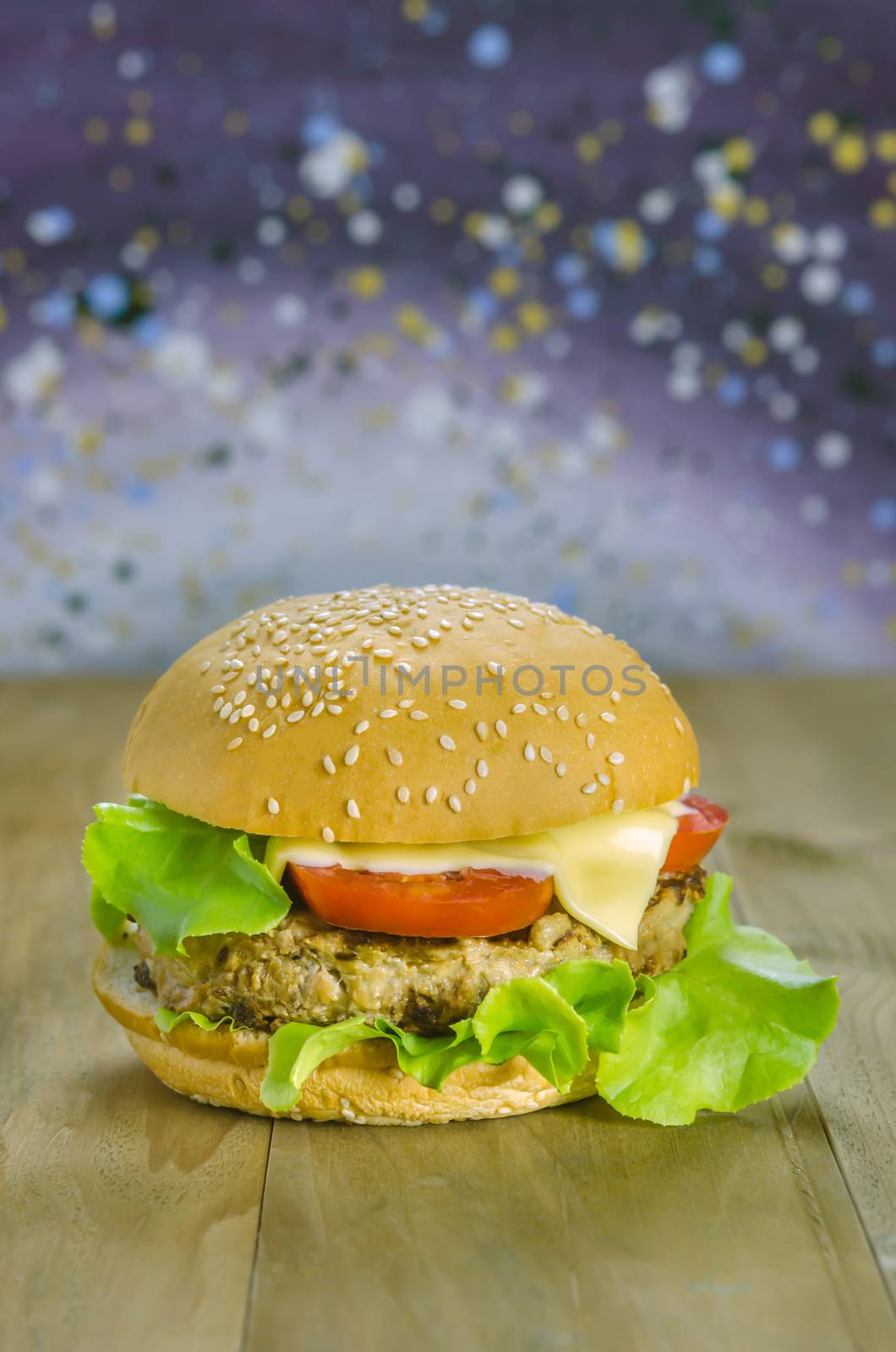 Closeup of home made burgers on wooden background