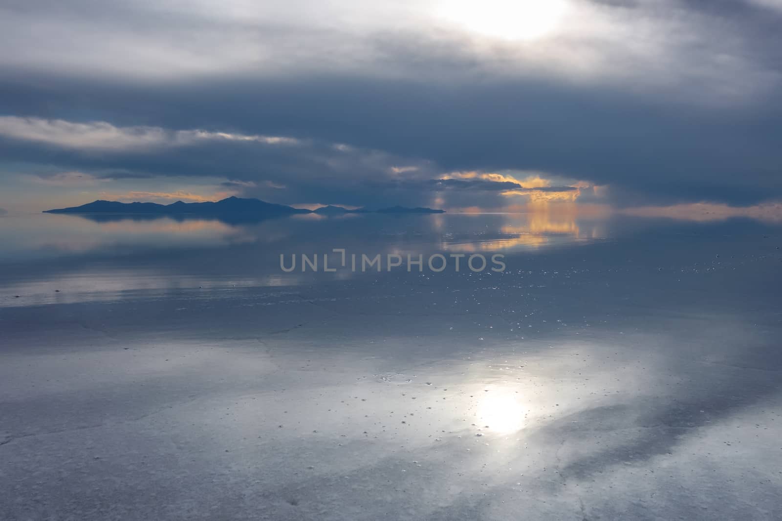 Sunset in Salar de Uyuni salt flats desert, Andes Altiplano, Bolivia