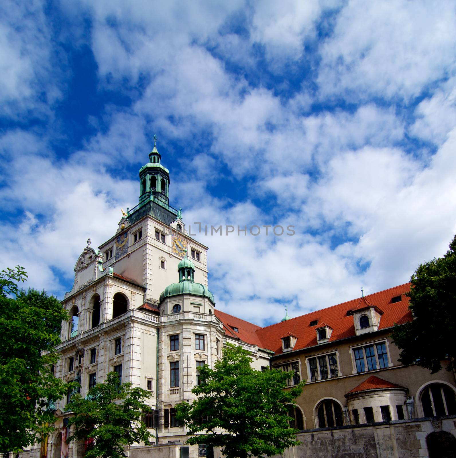Building of Bavarian National Museum Bottom up View against Cloudy Blue Sky Outdoors. Munich, Germany