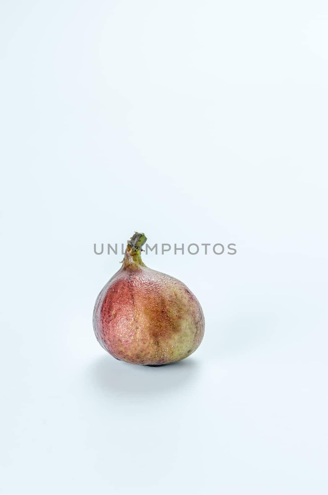 Ripe sweet fig , fresh fruit on white background