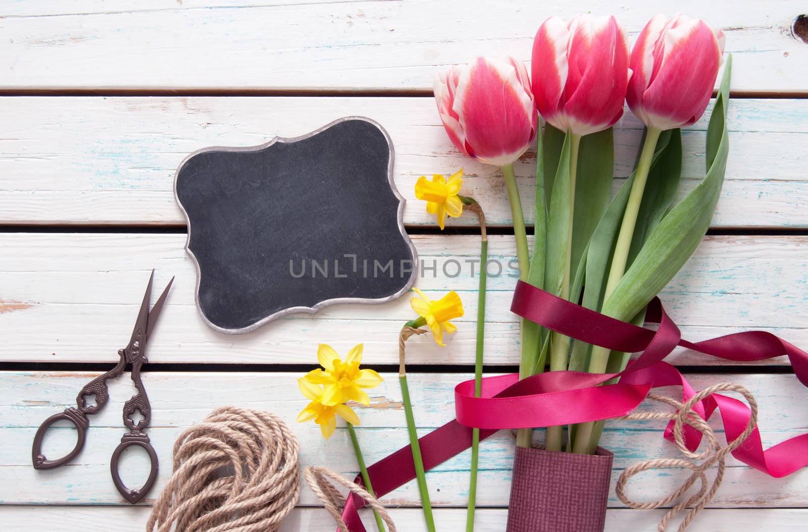 Spring tulip bouquet with small blackboard sign