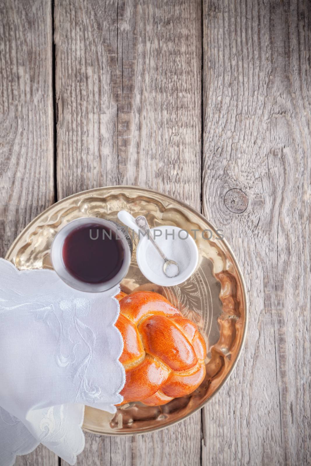 Wine, challah on a wooden surface. Jewish Sabbath by supercat67