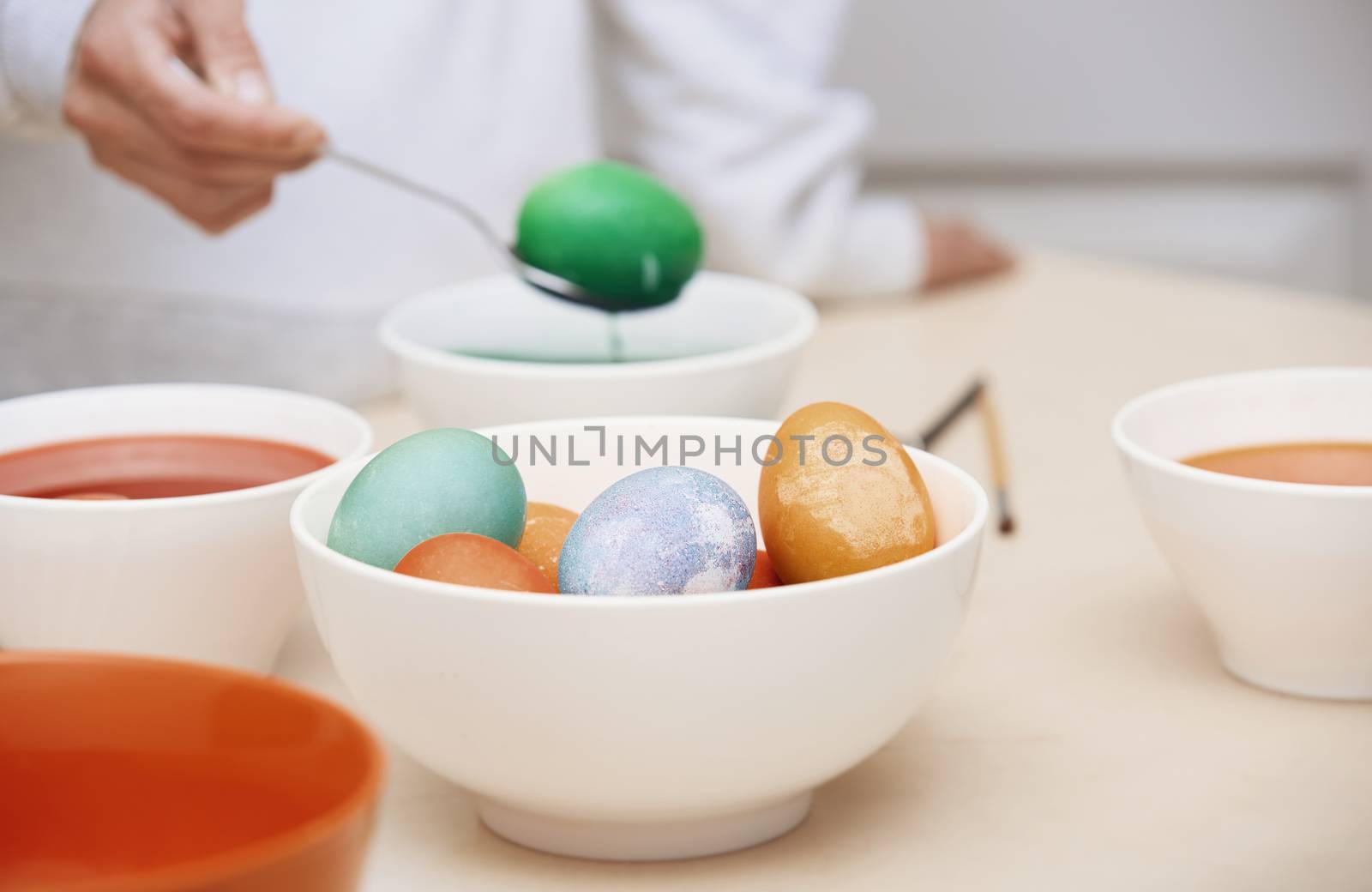 Woman preparing Easter eggs
