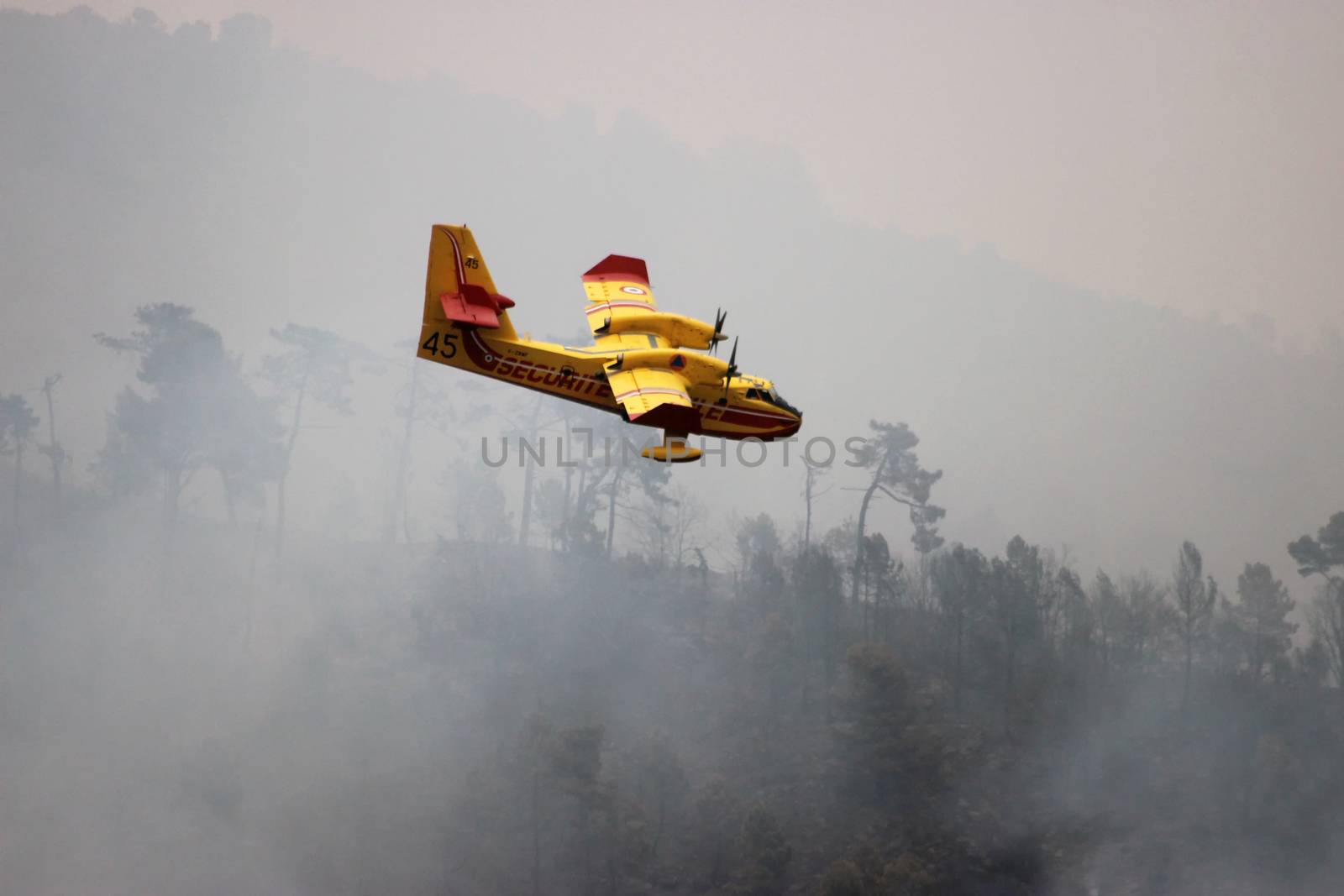 Airplanes Firefighter Leaving Water Against Fire by bensib