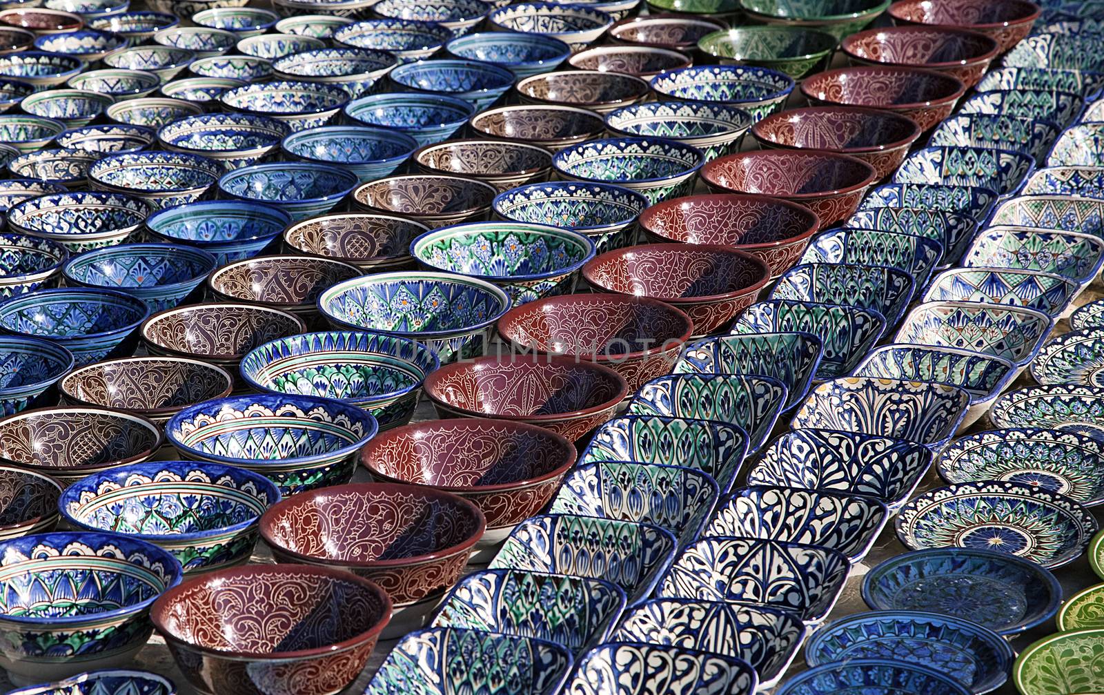 Traditional ceramic dishware in a street market, Uzbekistan