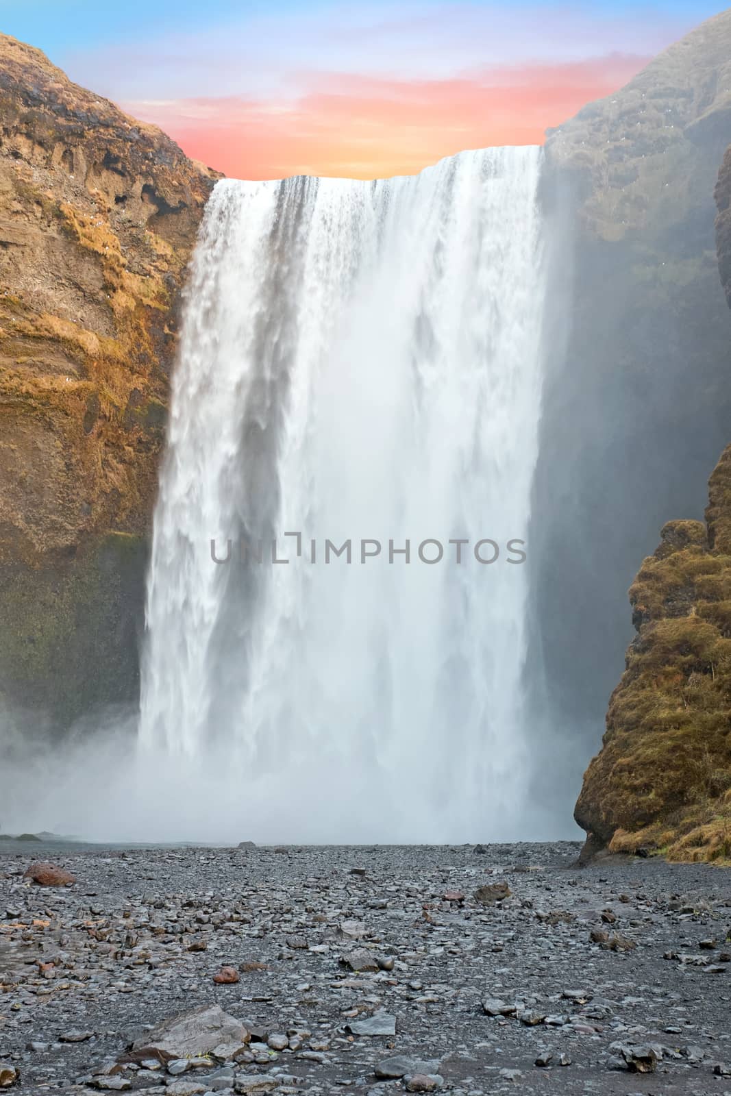 Waterfall Skogafoss in Iceland at sunset by devy