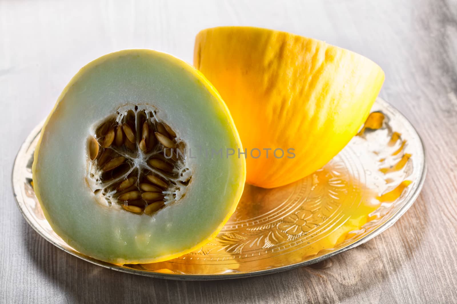 Cross Section of a honeydew melon on a table