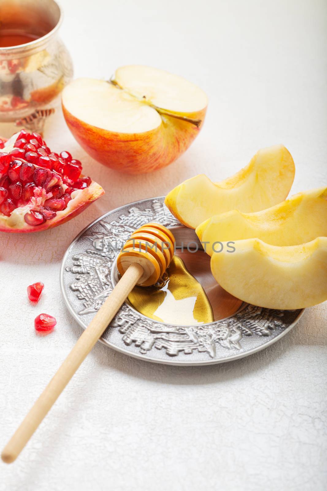 Apples, pomegranate and honey for Rosh Hashanah  by supercat67