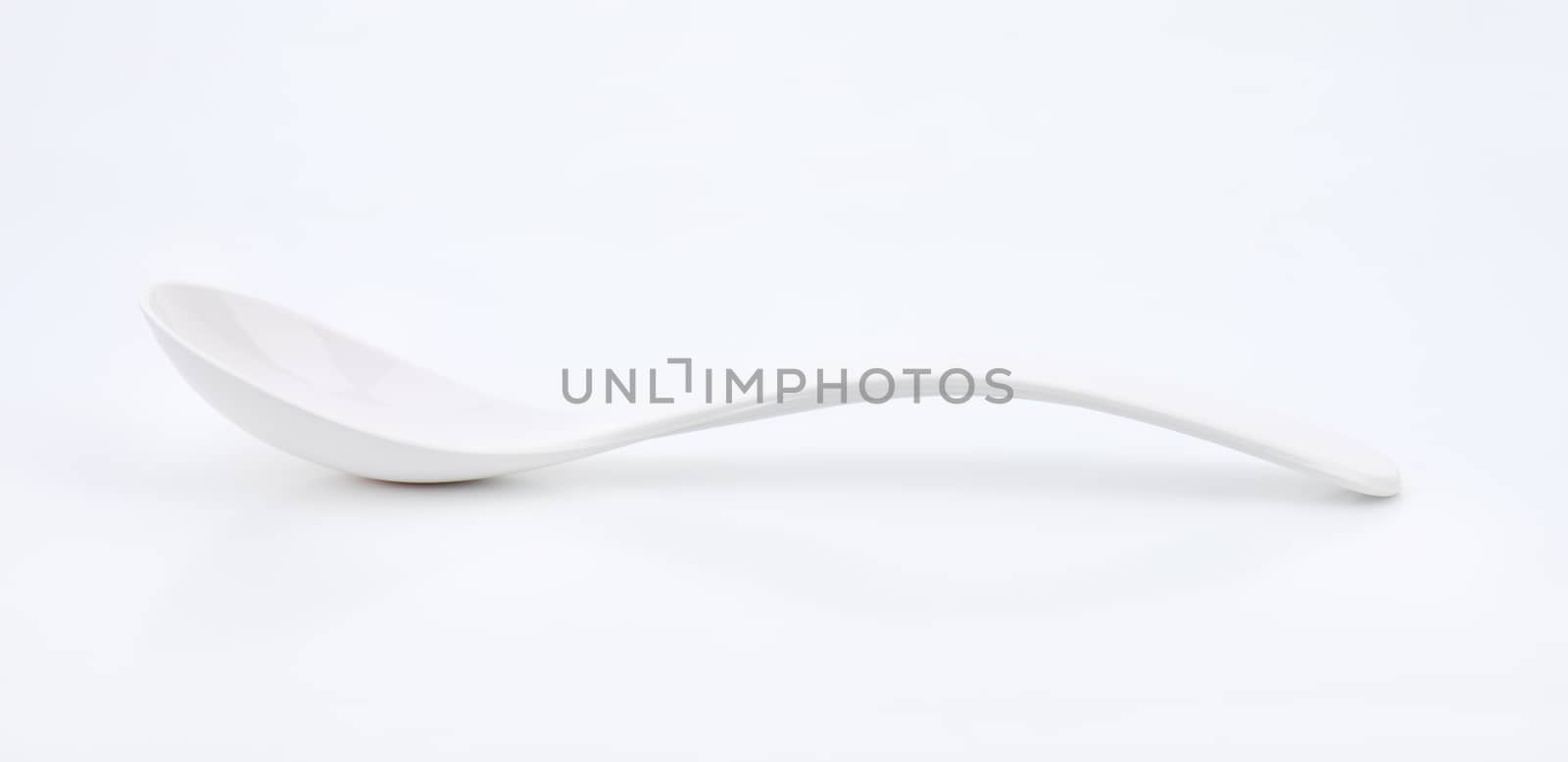 Plain white spoon with deep cup