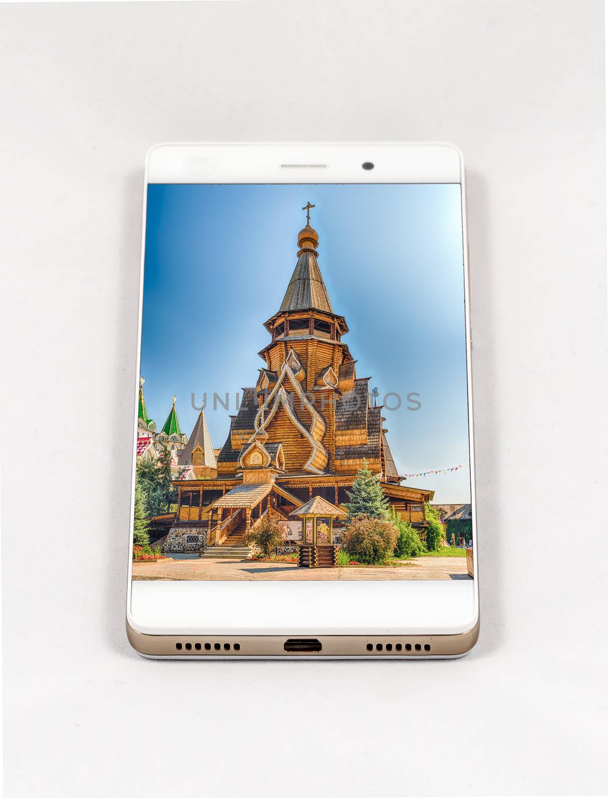 Modern smartphone displaying full screen picture of Moscow, Russ by marcorubino