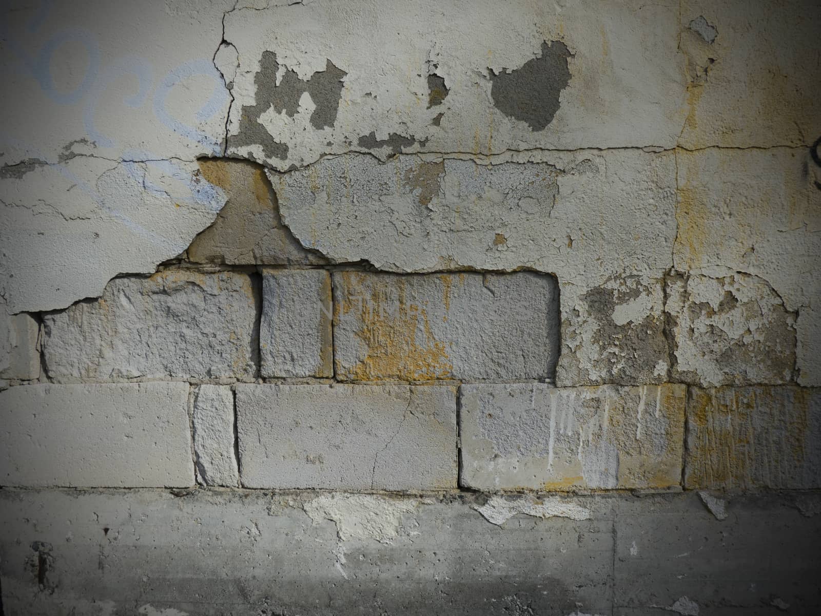 cement brick wall background with dark edges