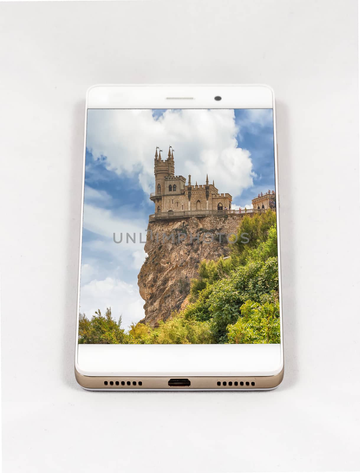 Modern smartphone displaying picture of Swallow's nest castle, Y by marcorubino