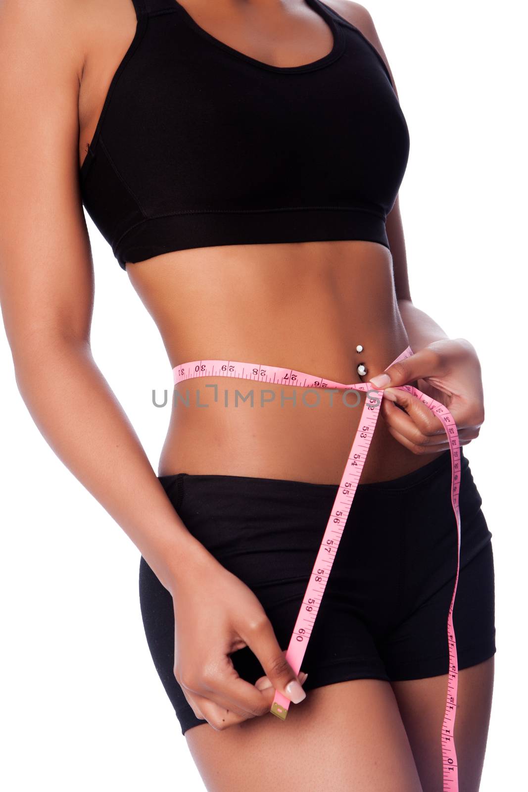 Healthy fit woman measuring waste, weightloss concept.
