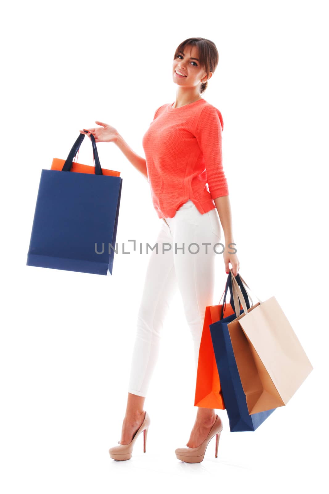 Woman with shopping bags isolated on white background