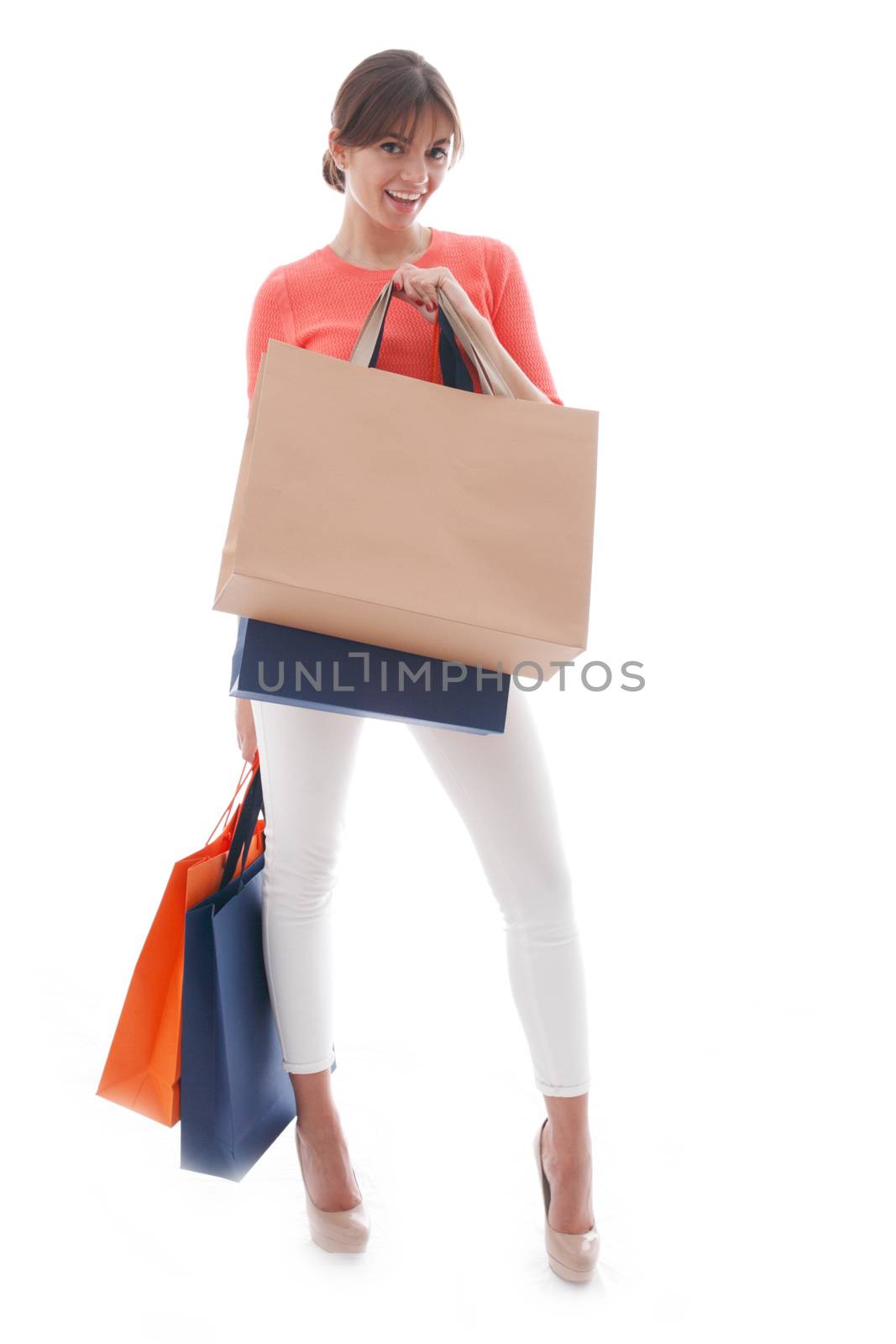 Woman with shopping bags isolated on white background