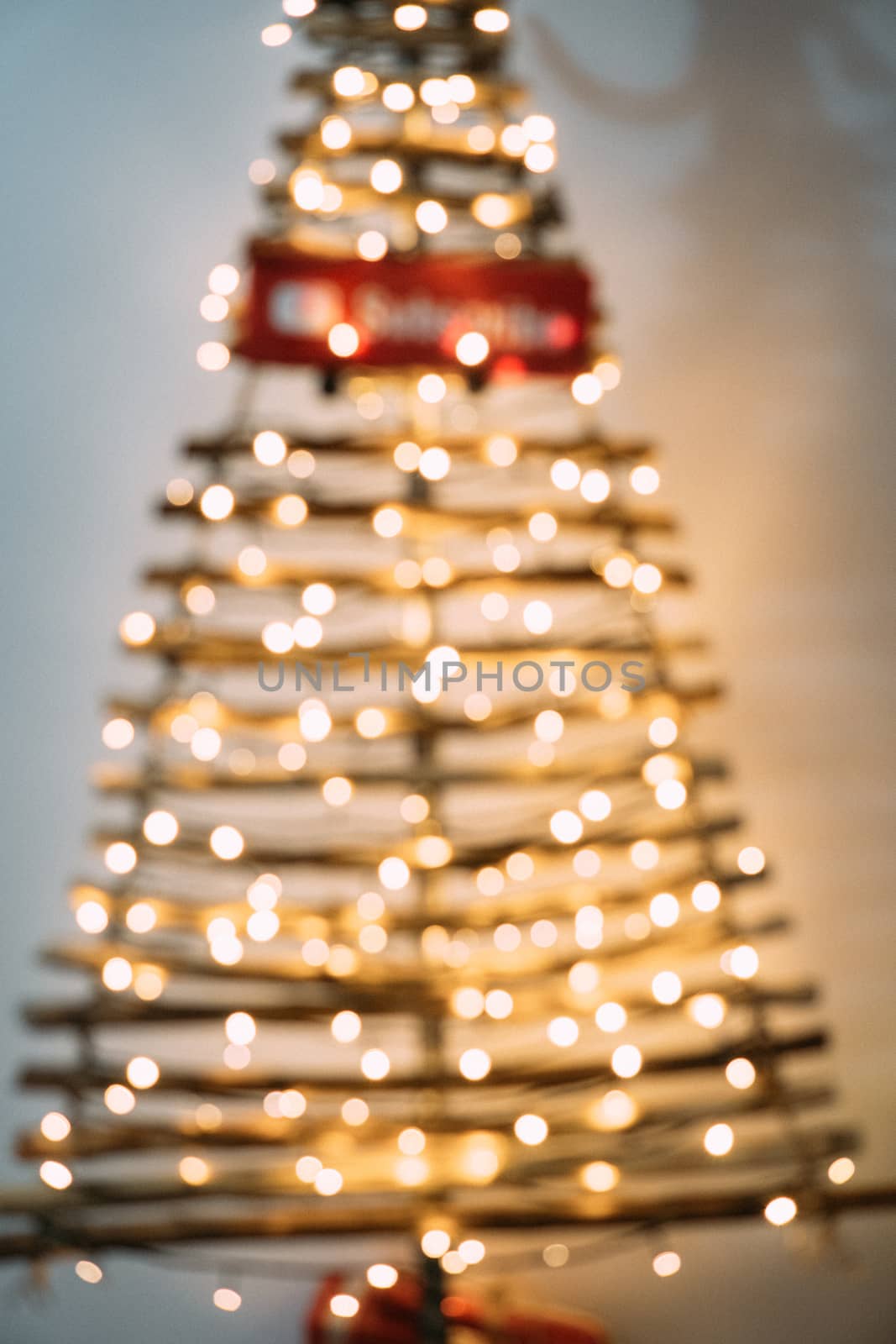 Christmas tree out of focus on a white background