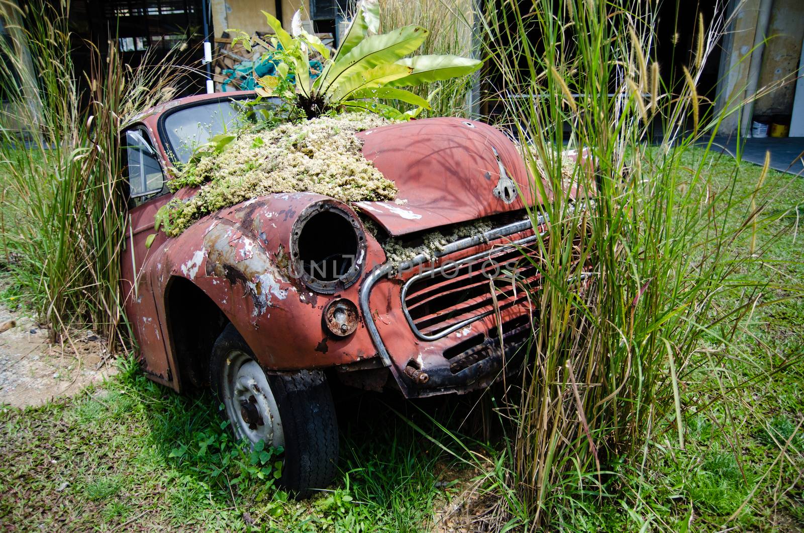 Abandoned old rusty car. Retro vintage background