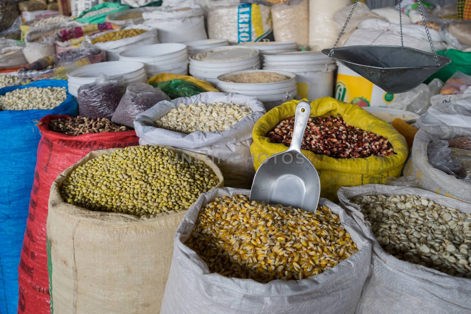 grains sold by the weight in the main market in Cuzco, Peru