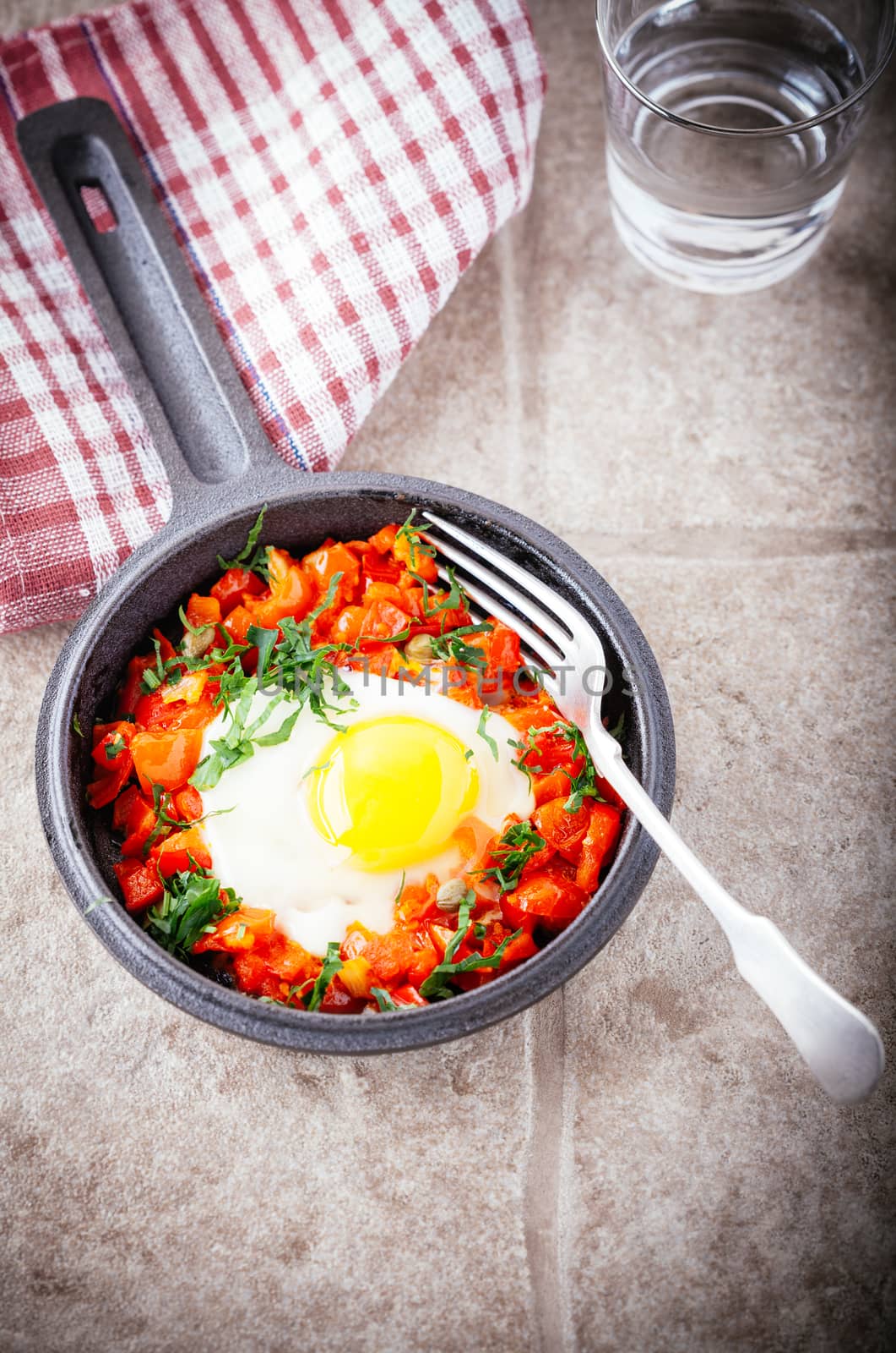 Traditional Middle Eastern dish of Shakshuka in a pan 