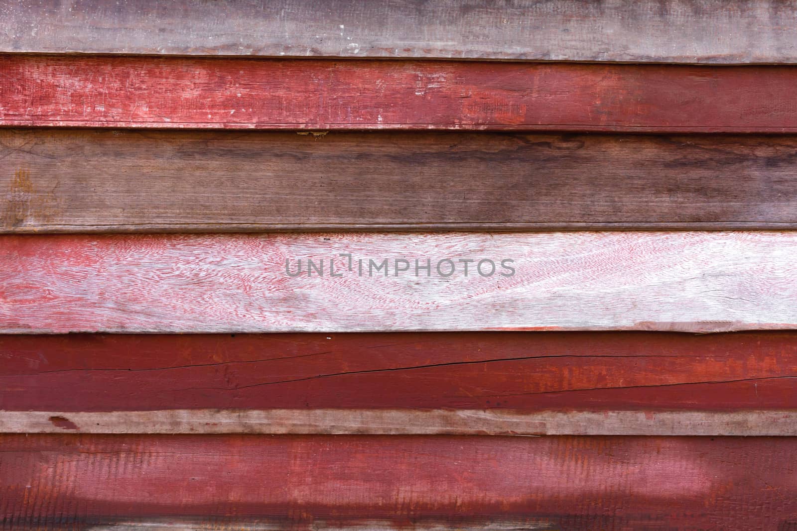 Red wood texture background by nopparats