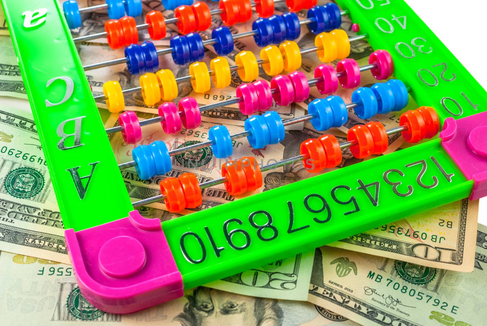 american dollars and colorful abacus on white background by uvisni