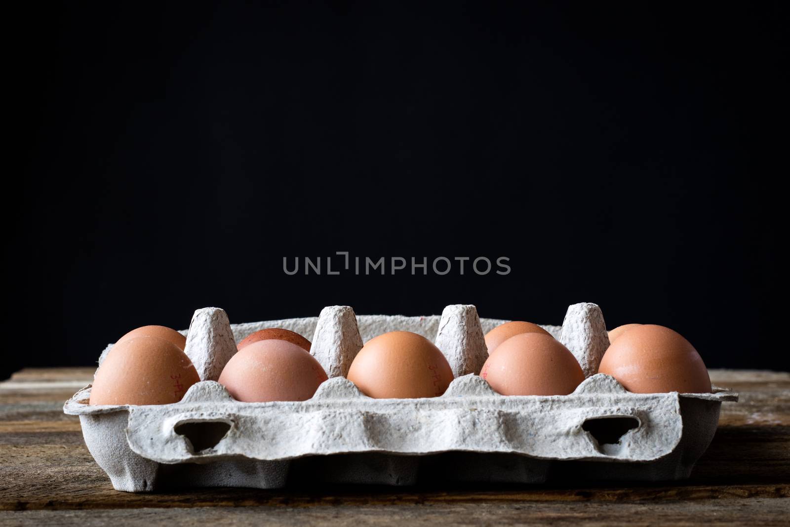 eggs canisters on an old wooden table