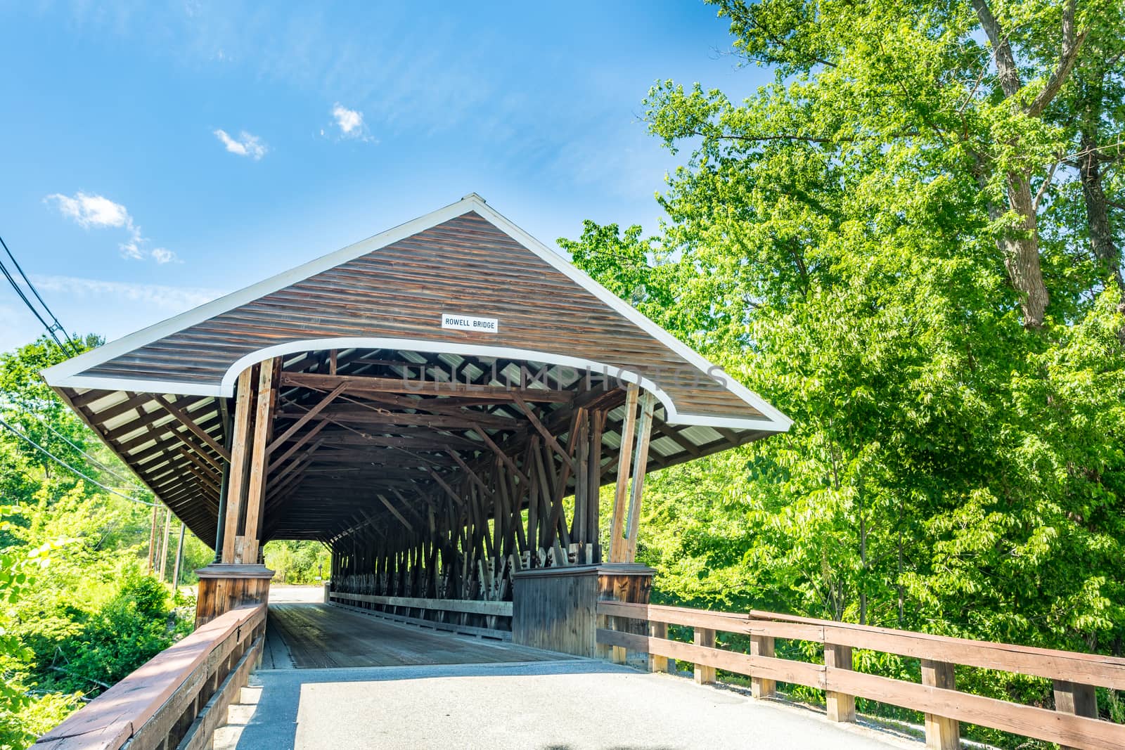 Rowell Covered Bridge is a covered bridge in Hopkinton, New Hampshire which carries Rowell Bridge Road over the Contoocook River. It is a long truss style bridge.