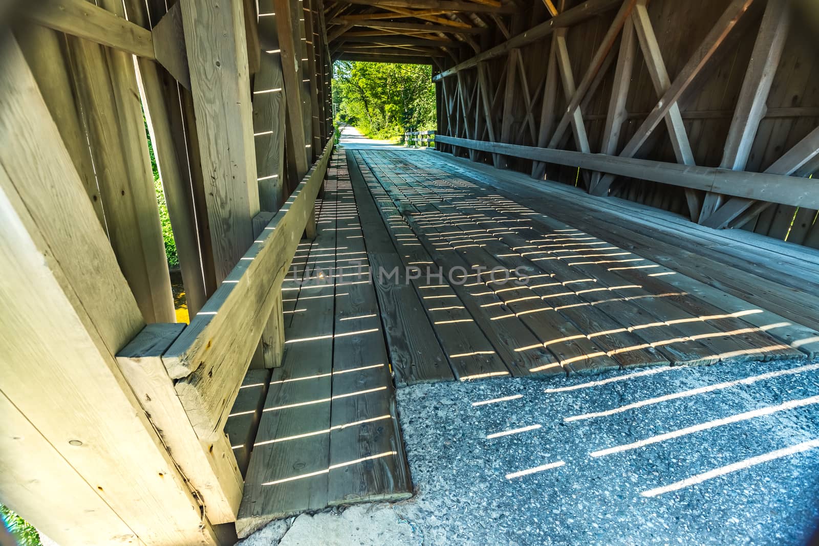 The Bement Covered Bridge, a long truss bridge, is a historic wooden covered bridge on Center Road over the Warner River in Bradford, New Hampshire.