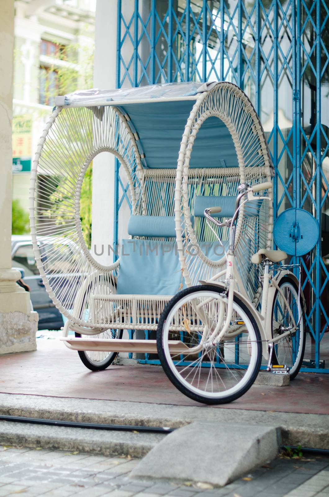 Pahang, Malaysia. Vintage Trishaw stop beside road for service traveller