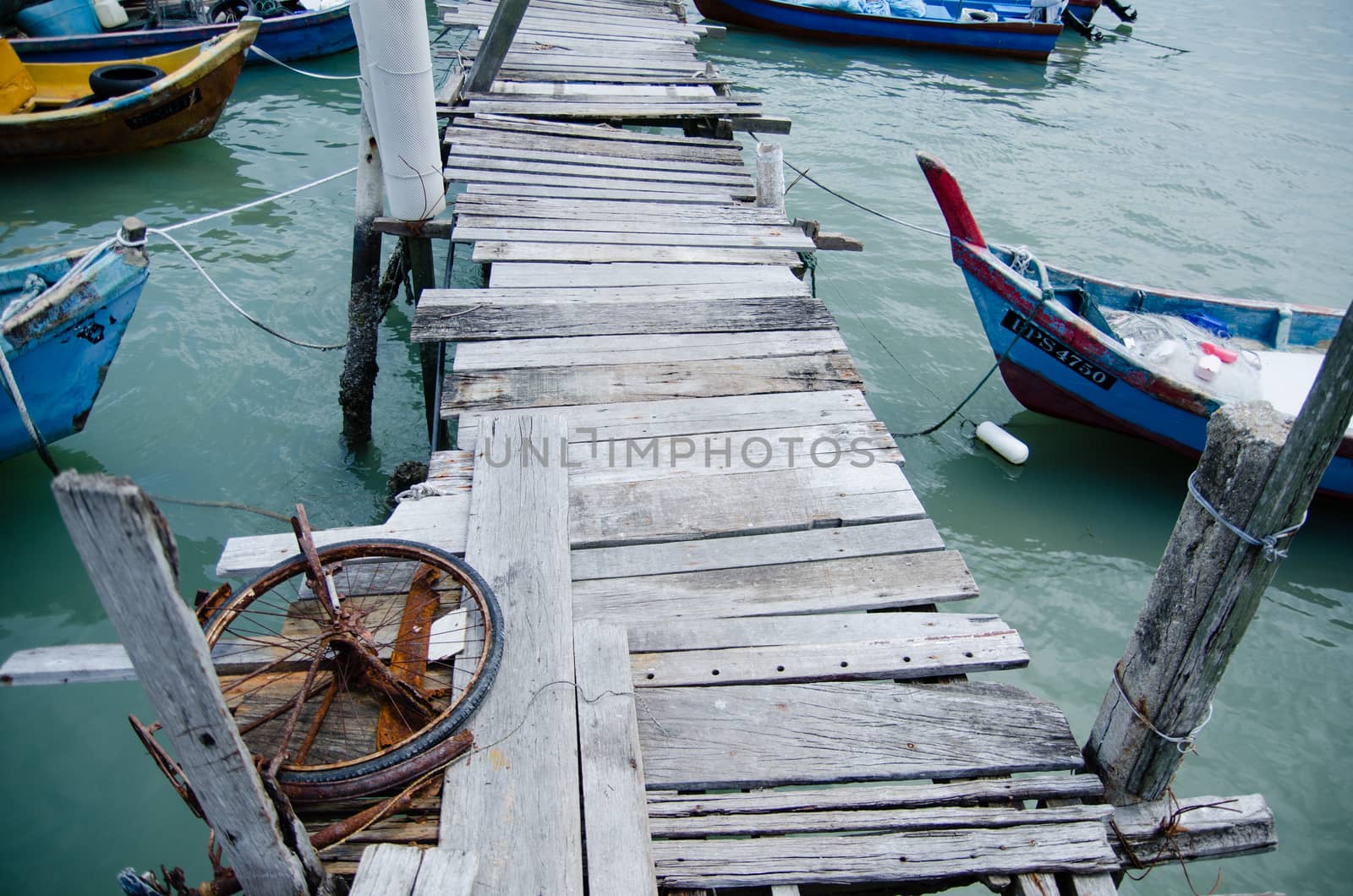 Wooden pier on the sea background by Vanzyst