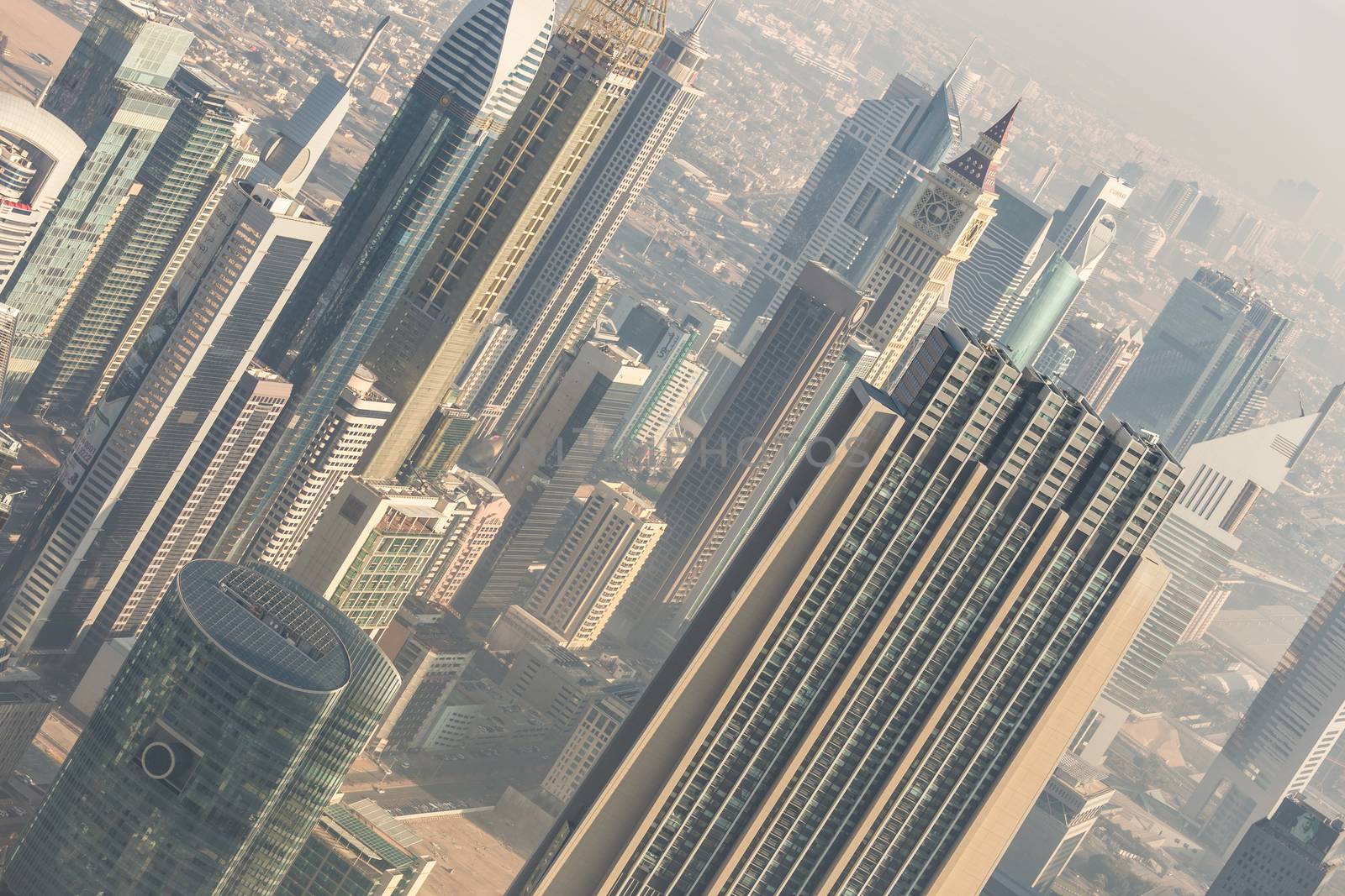 Aerial view of Dubai downtown skyscrapers. Sheikh Zayed Road skyscrapers. Dubai Metro station Financial center.