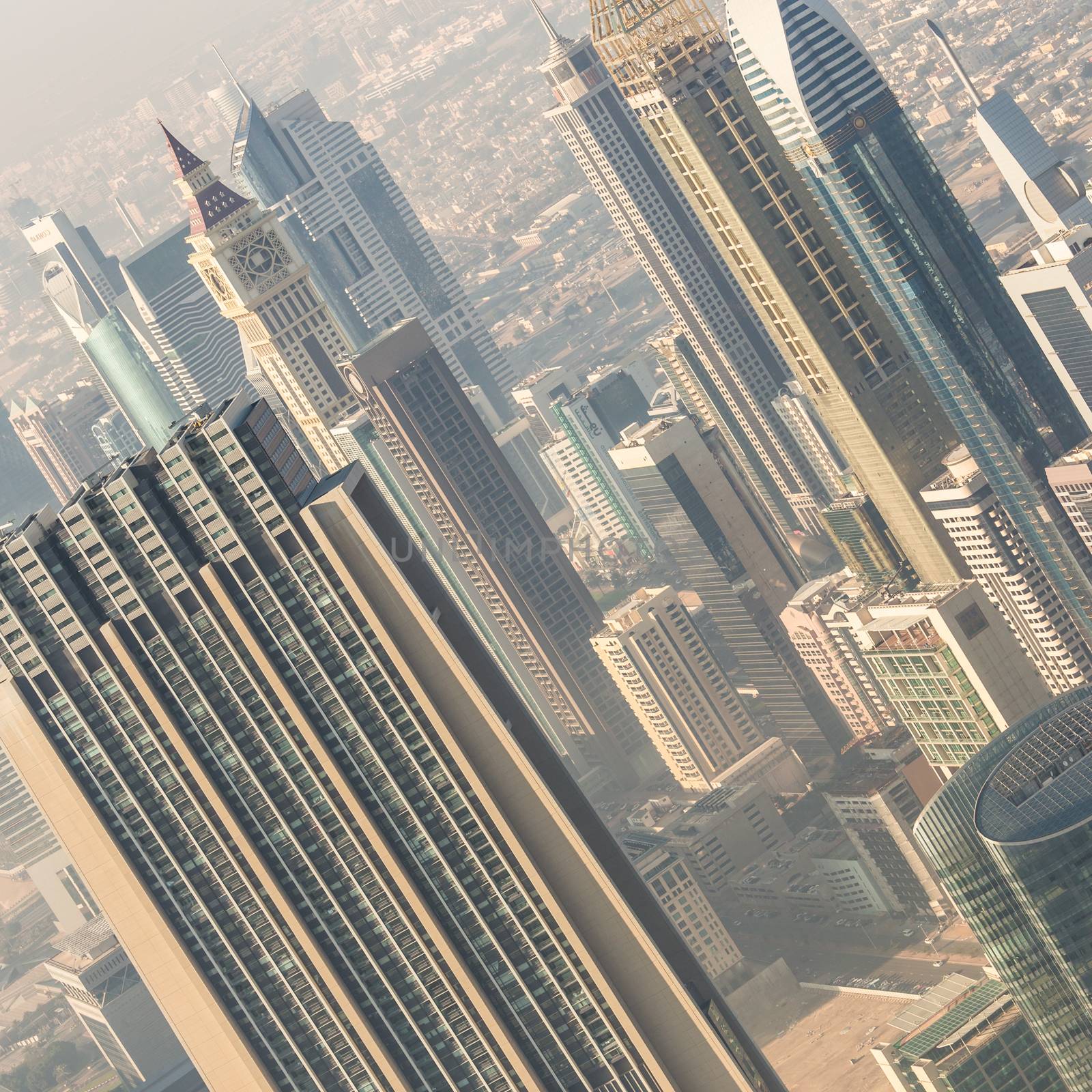 Aerial view of Dubai downtown skyscrapers. Sheikh Zayed Road skyscrapers. Dubai Metro station Financial center.
