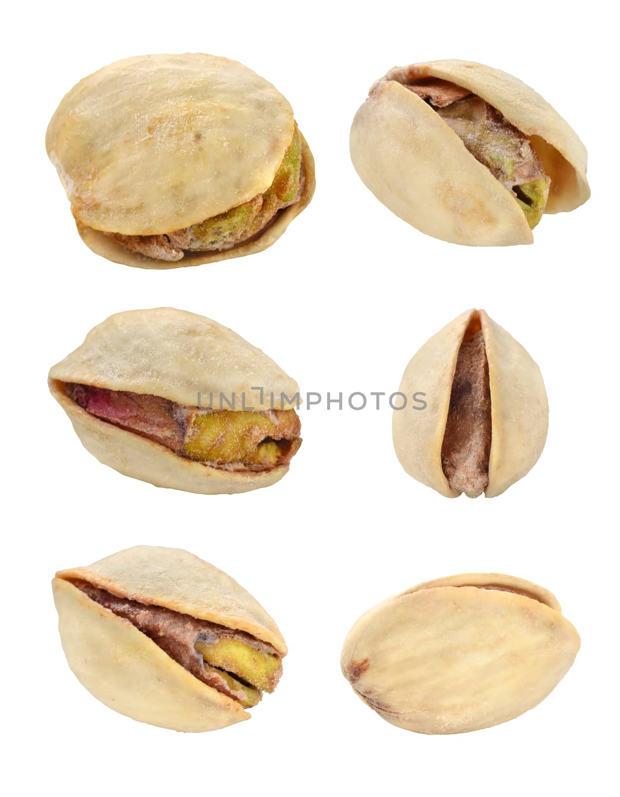 Pistachio nuts isolated with path on white background. Macro image.