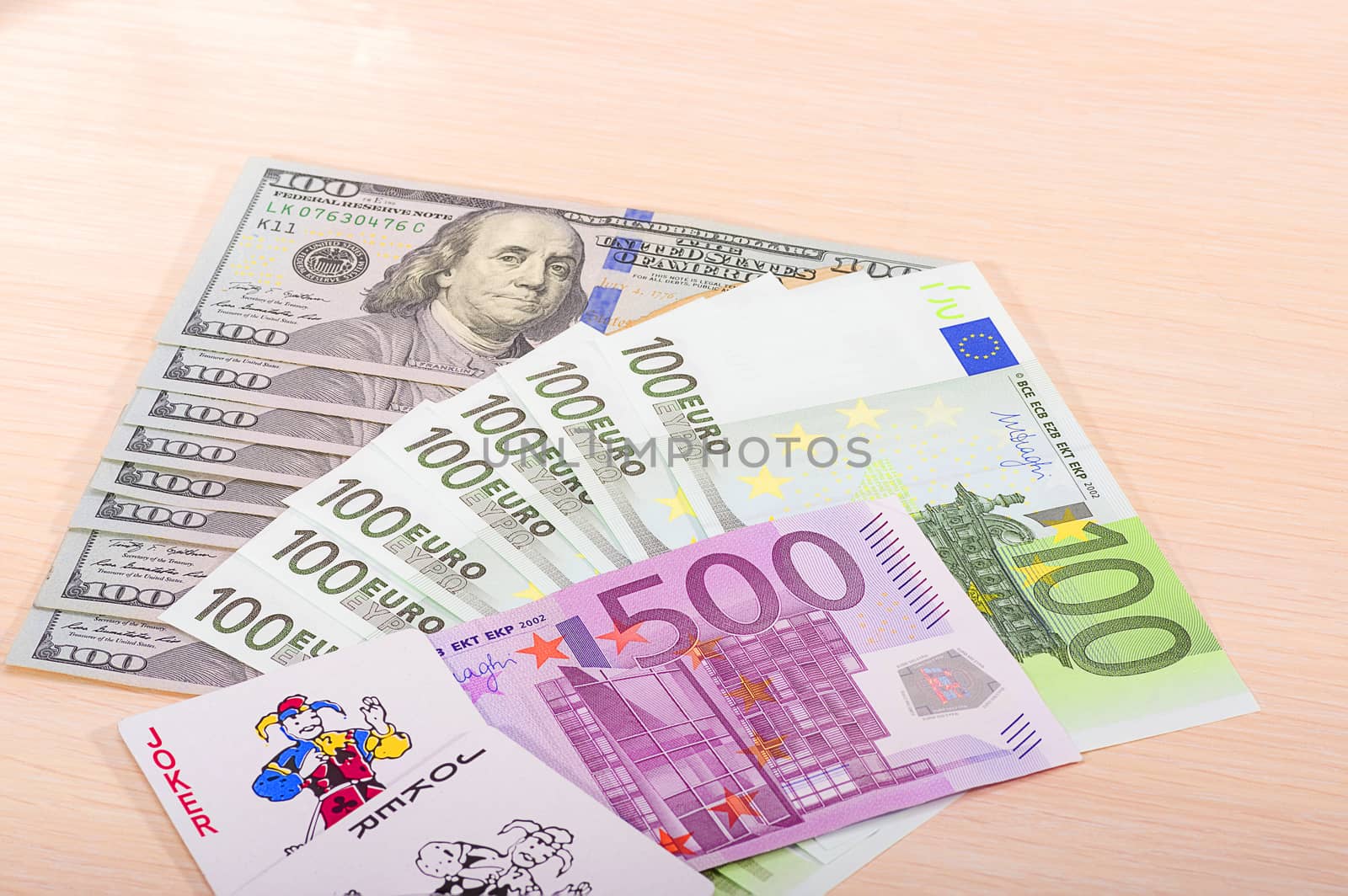 Different money bills and coins lie on the table close-up