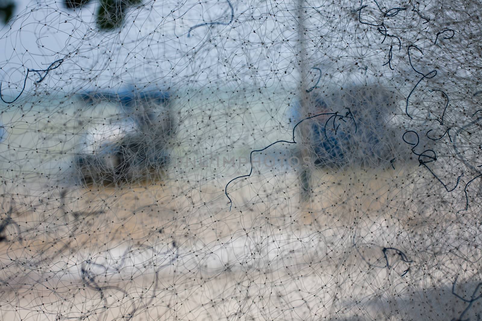 Background of color fishing net and cord rope laces line on the heap