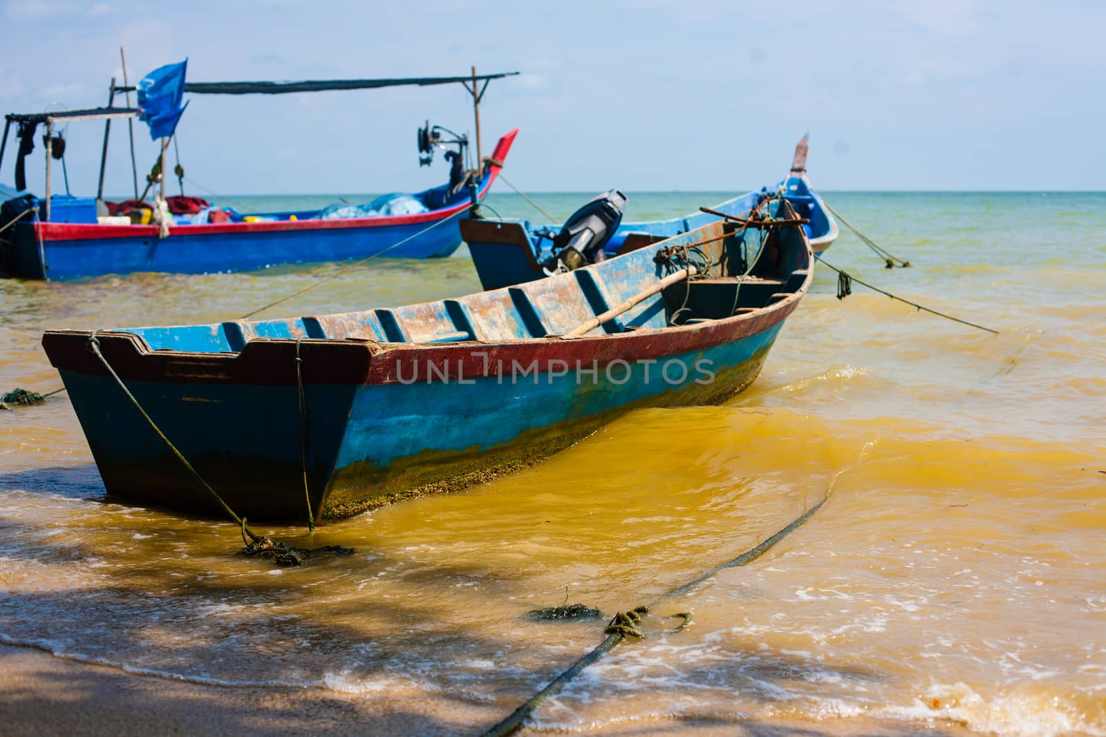 Penang island Malaysia. Boats near Malaysia tropic beach. Fish industry. Beautiful seascape 