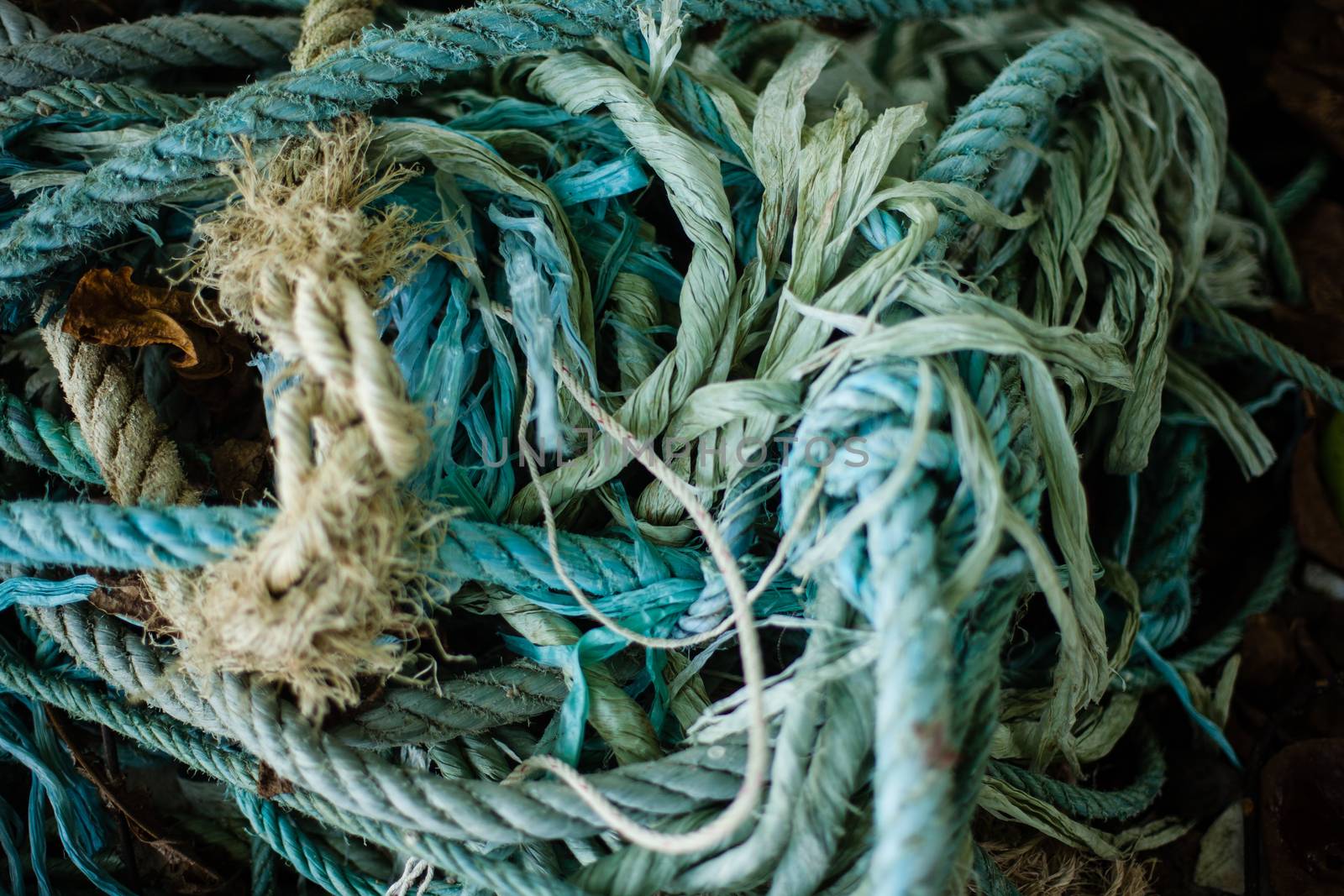 Background of color fishing net and cord rope laces line on the heap