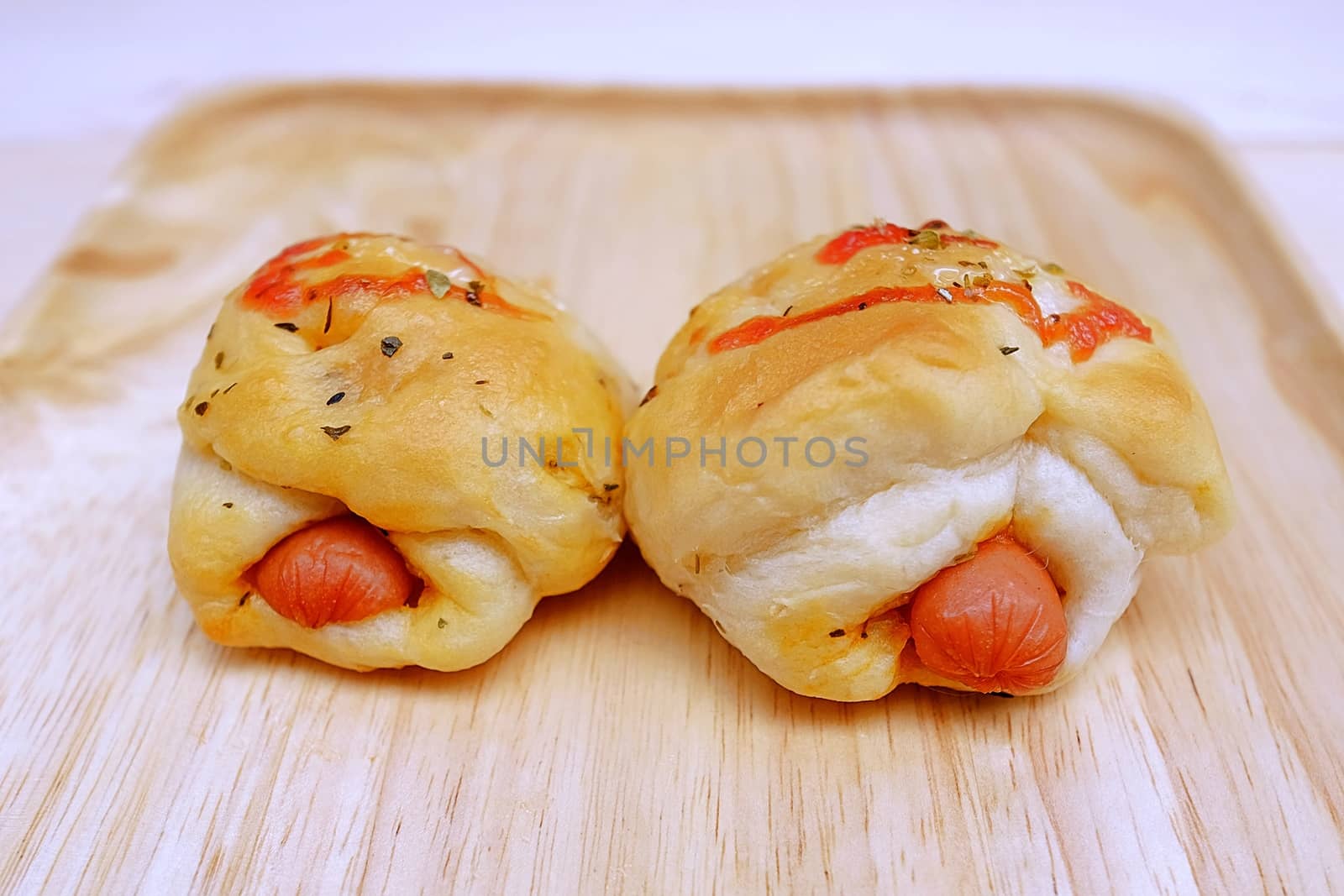 Sausage Bread with Tomato Sauce in Dish on Table Wood