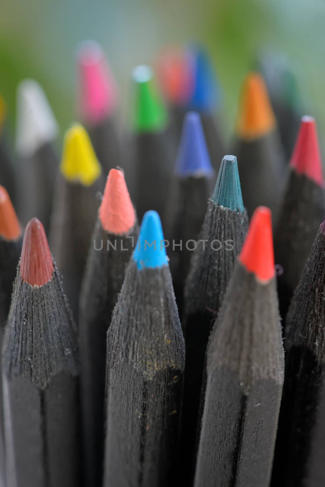 Colored  black pencils in jar