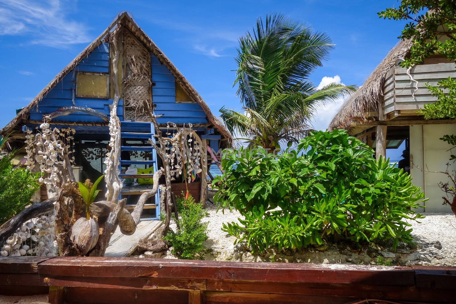 Traditional tropical hut the beach in Moorea Island by daboost