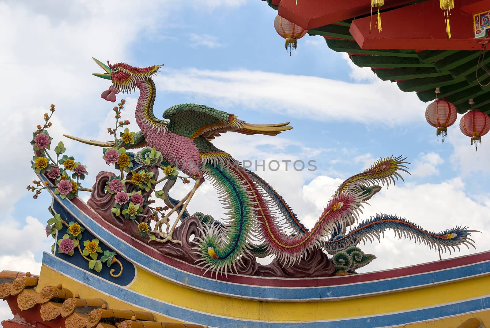 Phoenix Bird Sculpture on Chinese Temple Roof Top in Southeast Asia