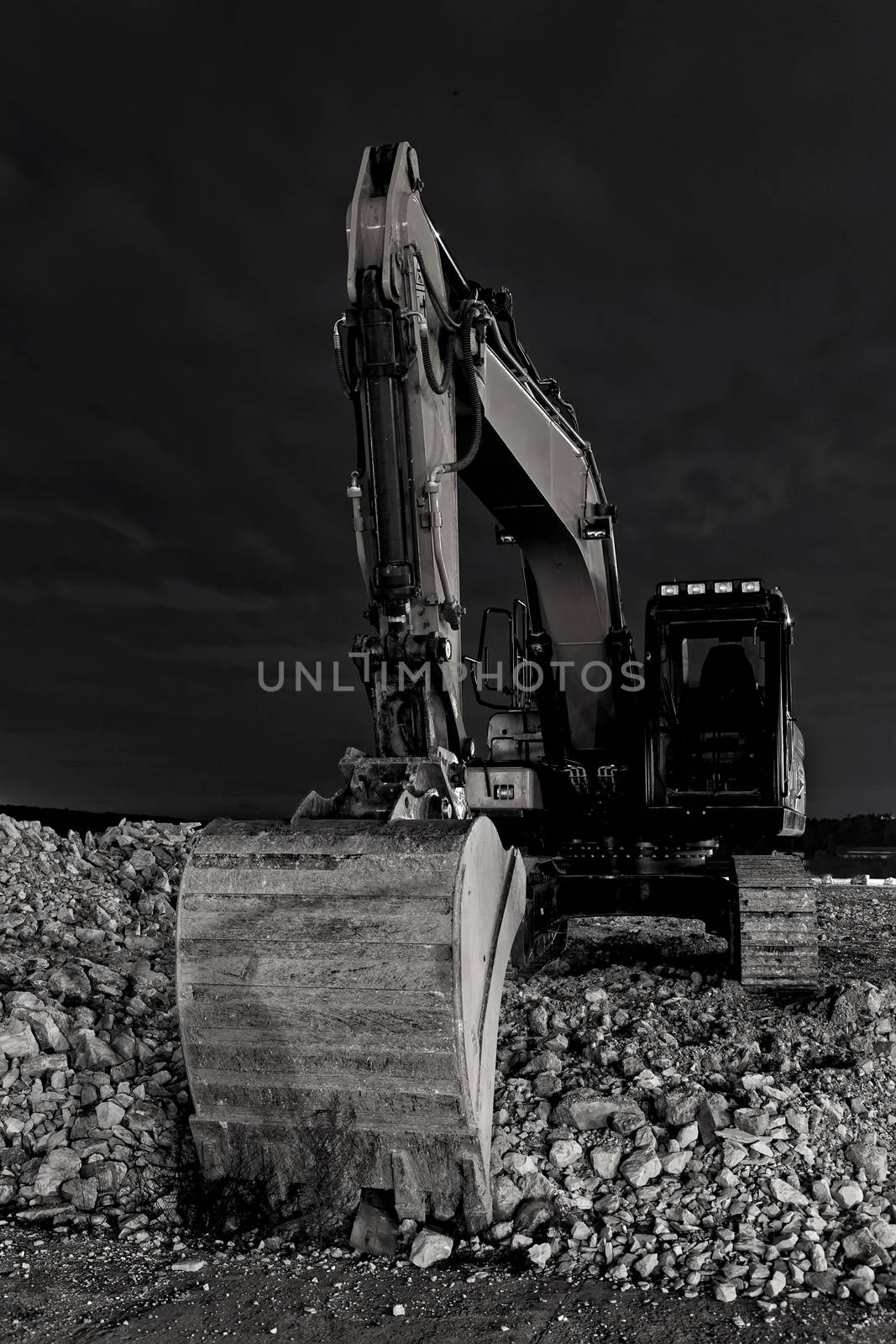 close up excavator at night, front view