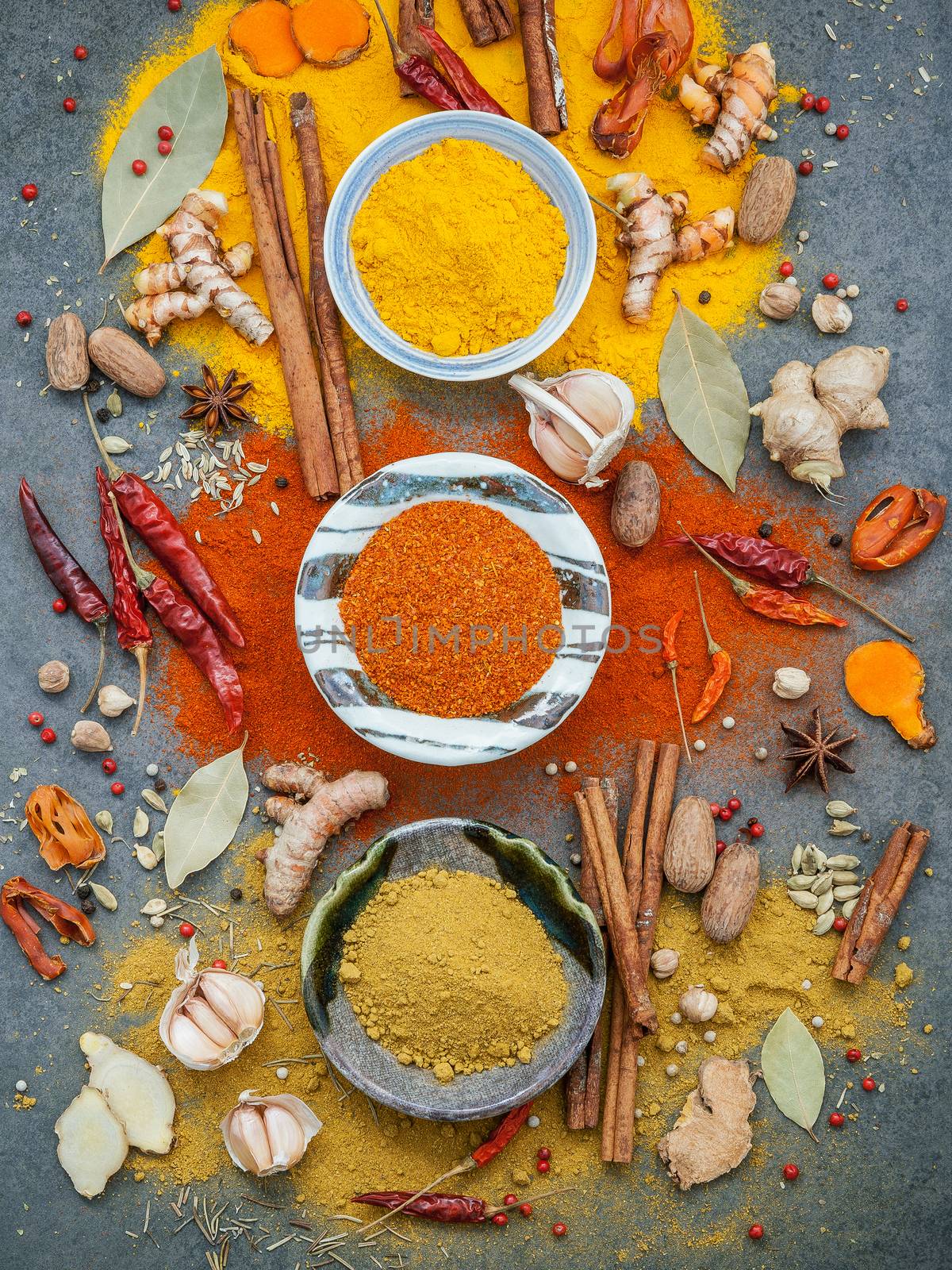 Various of spices and herbs in ceramic bowl. Flat lay of spices  by kerdkanno