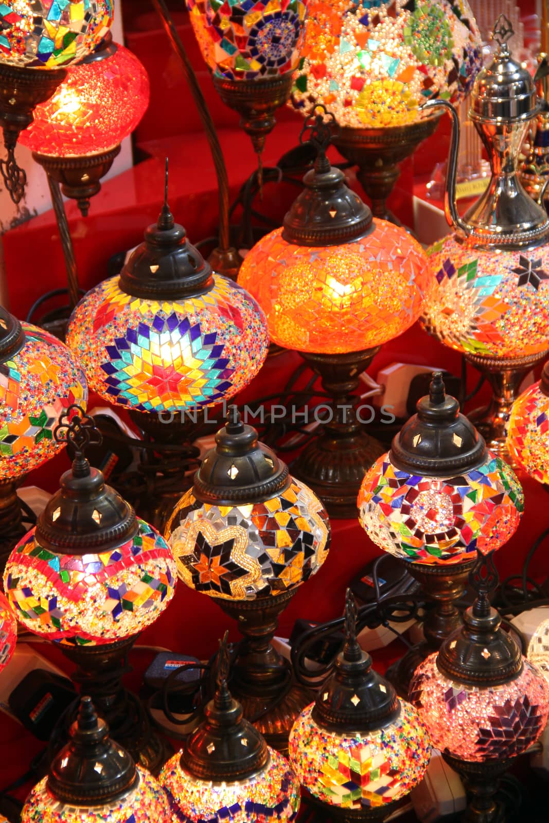 Beautiful traditional lamps hand painted painted with bright colors in traditional Arabic design.
