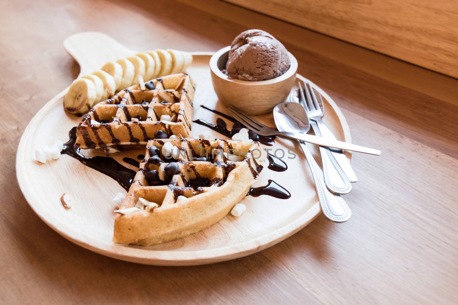 Belgian waffles with fruit and chocolate, forest fruit, all homemade, delicious batter.