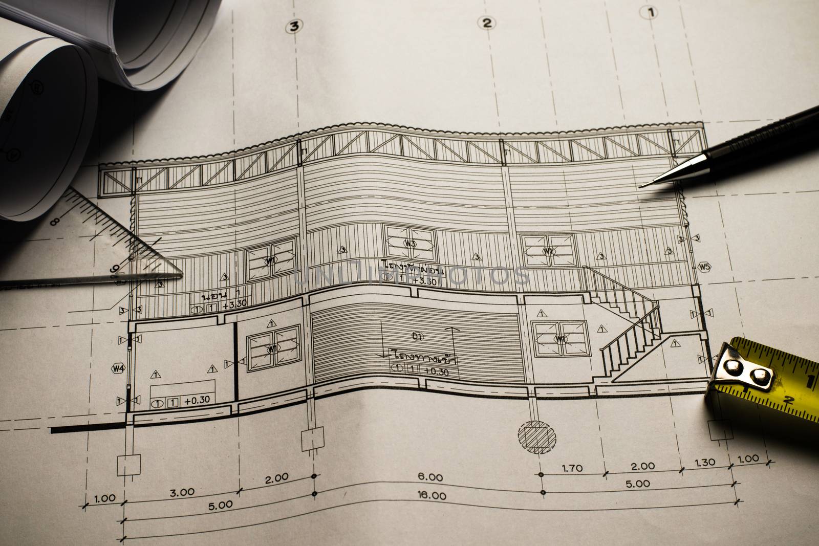 Engineering diagram blueprint paper drafting project sketch architectural,selective focus.