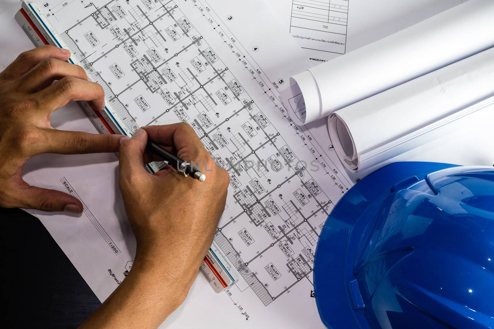 Engineering diagram blueprint paper drafting project sketch architectural,selective focus.