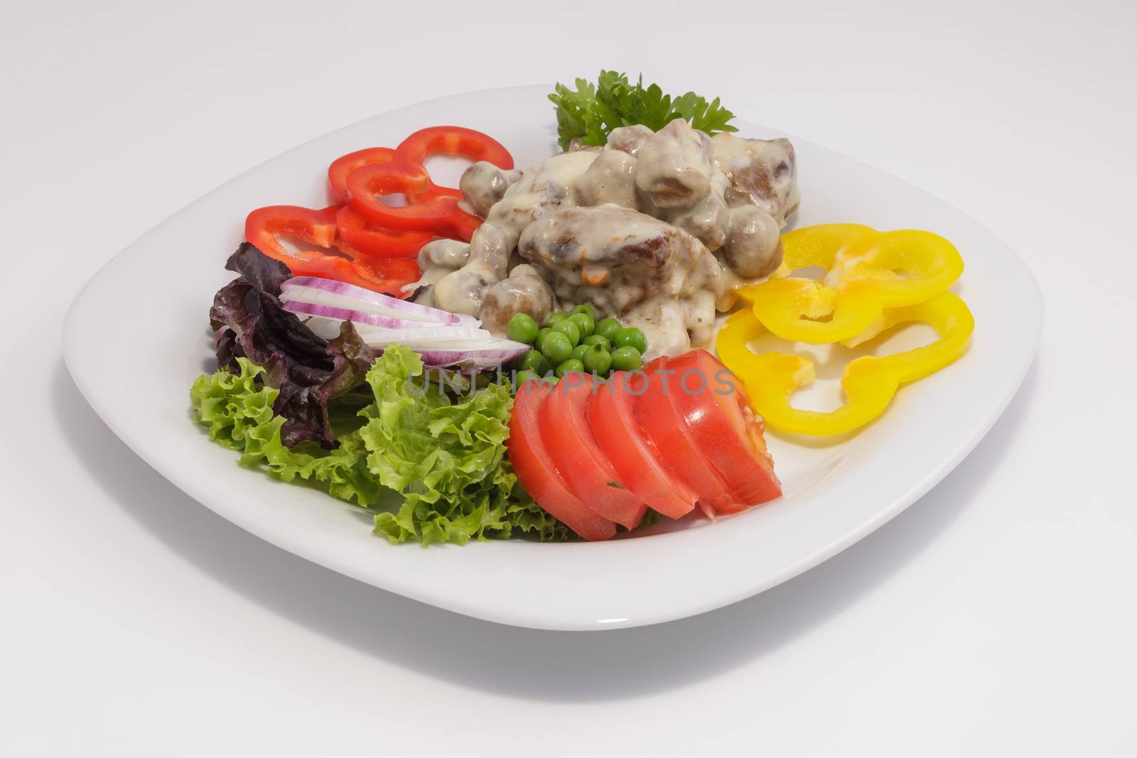 Champignons with sauce with fresh vegetables and herbs. View from above