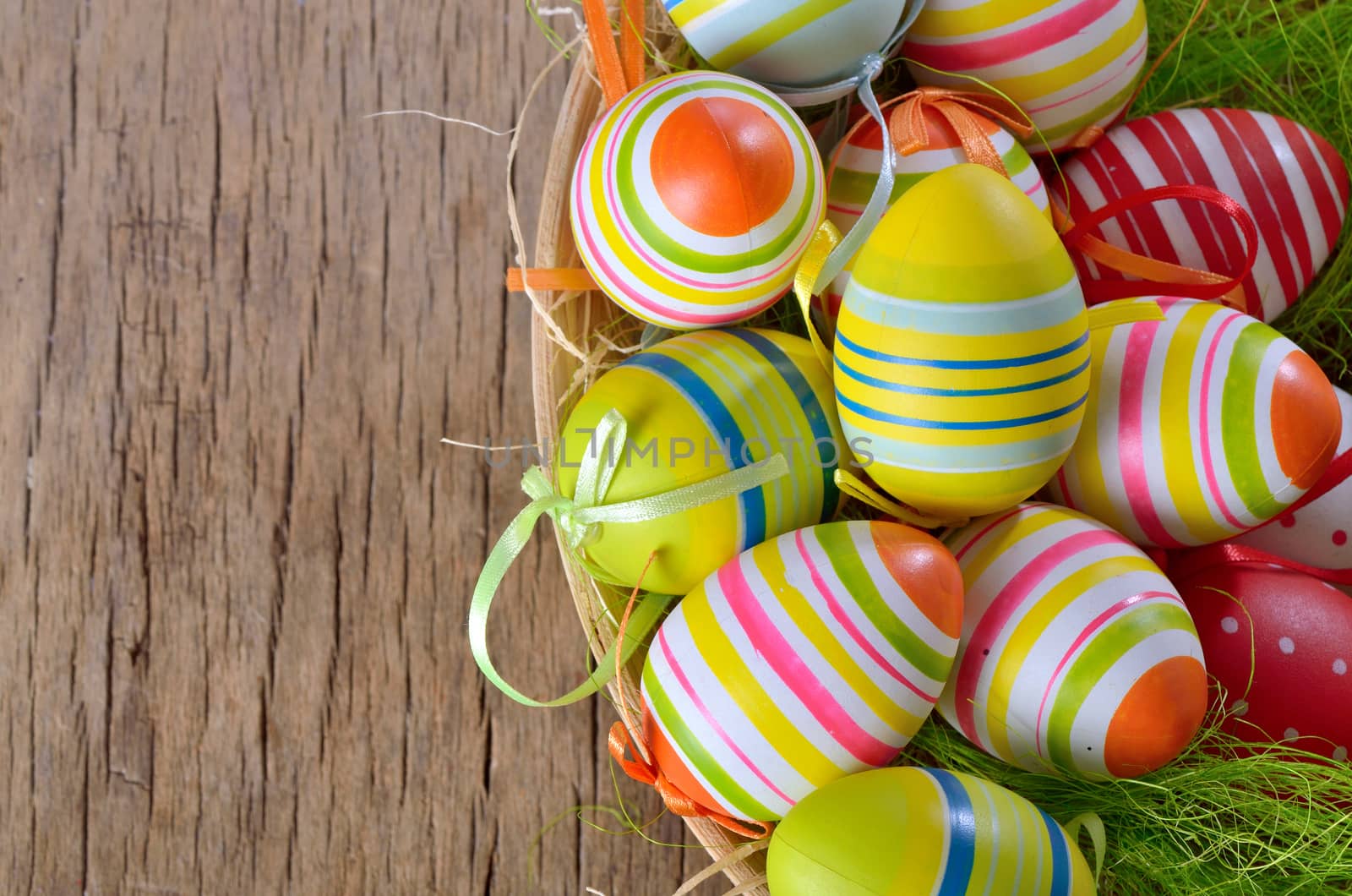 Colorful easter eggs isolated in basket